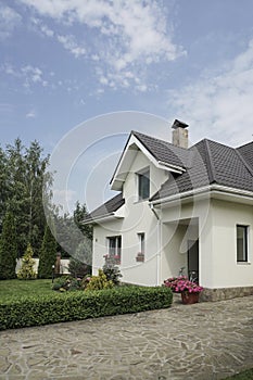 New house with a garden in a rural area