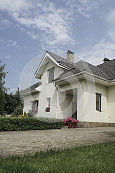 New house with a garden in a rural area