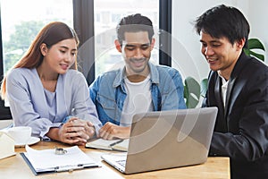 New house / home moving and relocation concept. Happy asian couple talking with apartment landlord from real estate agent /