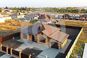 new house, the roof of which is made of metal. Cottage in the countryside