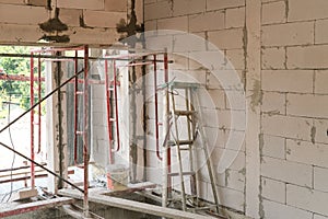 New house structure use lightweight cement brick and white lintel plaster to joint for reinforce in site. Stair prepare for work