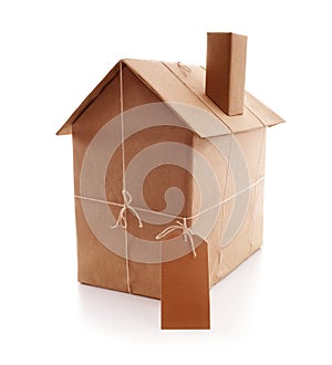 New house wrapped in brown paper
