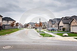 New Houses along a Street in a Residential District photo