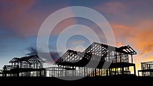 New housing construction showing house framework in various stages of being built at sunrise