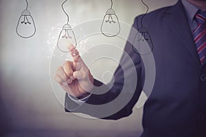 New idea creative idea.Concept of idea and innovation.Hand touch Light blub