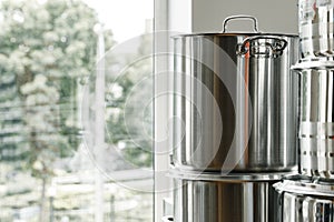 New industrial cooking pots on proffesional kitchen