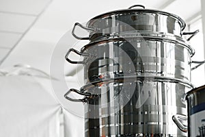 New industrial cooking pots on proffesional kitchen