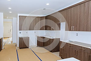 New installed wood kitchen cabinets with modern decorative stainless steel