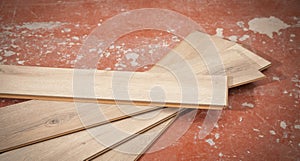 New laminates lying on old floor. Renovation of floor