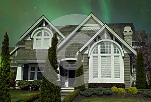 New Large Designer Home House Exterior Dramatic Northern Lights Sky Background