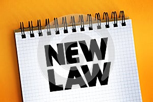 New Law text on notepad, concept background