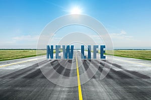 New life change concept with a bright sun in the sky and the inscription on the road