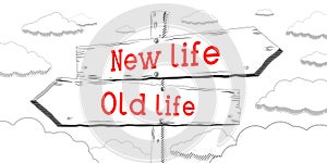 New life, old life - outline signpost with two arrows