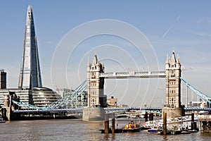 New London skyline with Tower Bridge and the new The Shard. Shot in 2013 photo