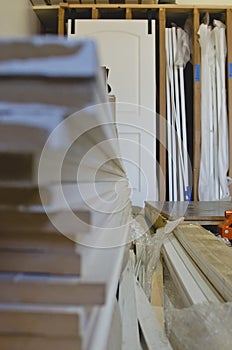 A long stack of MDF boards in the back shop