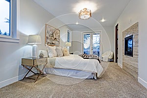 New luxury custom built home with white master bedroom.