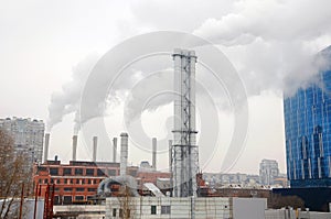 New metallic pipe gas boiler house on background blue sky. the concept of progress in the energy industry. Factory Pipes