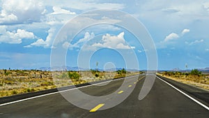 New Mexico highway state route 90, from Lordsburg to Silver City, through dry, high desert, mountains in the distance