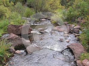 New Mexico hillside waterfalls stream whitewater river rocks wet water