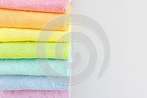 New microfiber cloth for cleaning and dusting. Seven rainbow colors. Top view, closeup