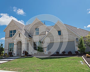 New model single-family house with American flag near Dallas, Texas