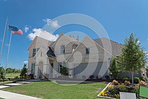 New model single-family house with American flag near Dallas, Texas