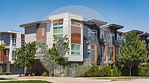 New Modern Apartment Buildings in Vancouver BC. Canadian modern residential architecture on sunny summer day