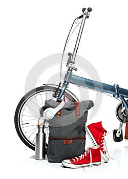 The new modern bicycle and suitcase, sneakers, thermos