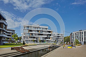 New modern block of flats in green area. residential apartment with flat buildings exterior. luxury house complex. Part of City