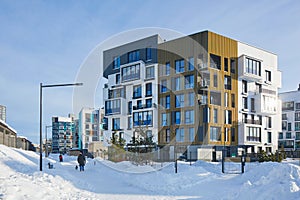 New modern block of flats in green area at winter. residential apartment with flat buildings exterior. City Real estate property