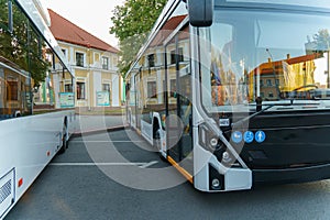 A new modern bus. Modern public electric transport. Details of the bus in close-up, headlights, windshield, driver\'s cabin