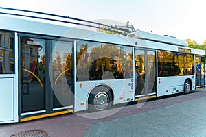 A new modern bus. Modern public electric transport. Details of the bus in close-up, headlights, windshield, driver\'s cabin