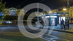 New modern trams of Croatian capital Zagreb night timelapse near railway station. CROATIA