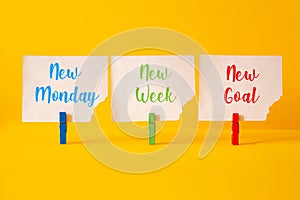 New monday,new week, new goal - word concept on building blocks, text