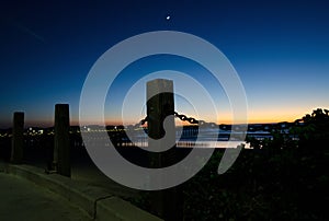 New moon on a late sunset near Pacific beach boardwalk - 4