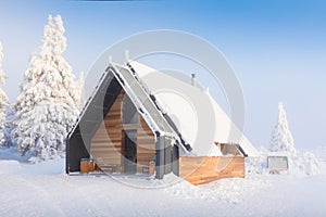 New mountain chalet on the top Velka Destna, Orlicke mountains, Eastern Bohemia, Czech Republic Beautiful winter landscape with fr