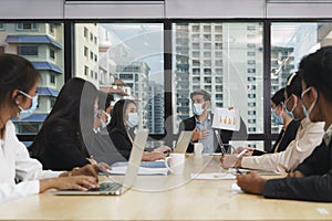 New normal of business practise to wear mask in working and meeting