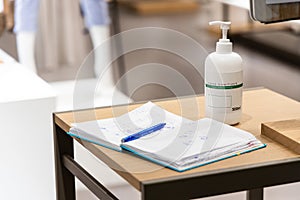 New normal of hand sanitizing and recording visitors details for traceability as requirement before entering retail shop