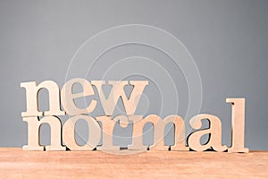 NEW NORMAL Wood Word photo