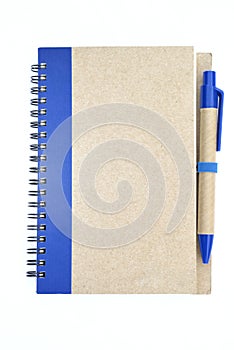 New notebook with blue pen