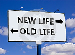New or old life symbol. Concept word New life Old life on beautiful billboard with two arrows. Beautiful blue sky with clouds
