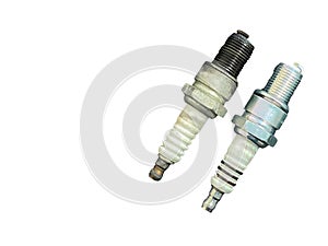 New and old Spark plugs on white background