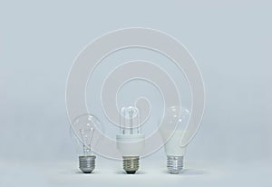 New and old tecnology Lightbulbs on white background