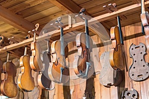 New and old violins in workshop