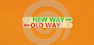 New or old way symbol. Concept word New way Old way on beautiful wooden stick. Beautiful orange table orange background. Business