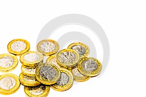 New one pound coins on a white background