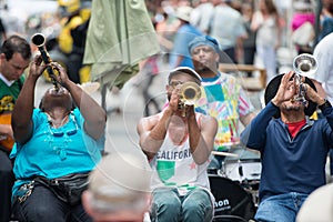 NEW ORLEANS - APRIL 13: In New Orleans, a jazz band plays jazz melodies in the street for donations from the tourists