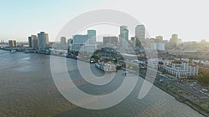 New Orleans Cityscape, Louisiana. City Skyline, Mississippi River and Steamboat Natchez in Background. Sunset Light I