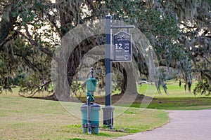 12th Hole Sign and Ball Washer at Golf Course in New Orleans