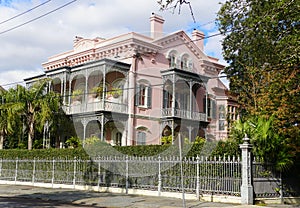 New Orleans, Louisiana, U.S.A - February 8, 2020 - A beautiful pink mansion near The Garden District